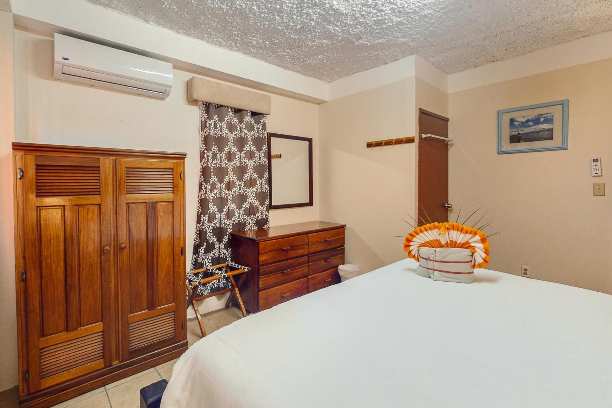 Hummingbird Home Suites San Pedro  Rom bilde
