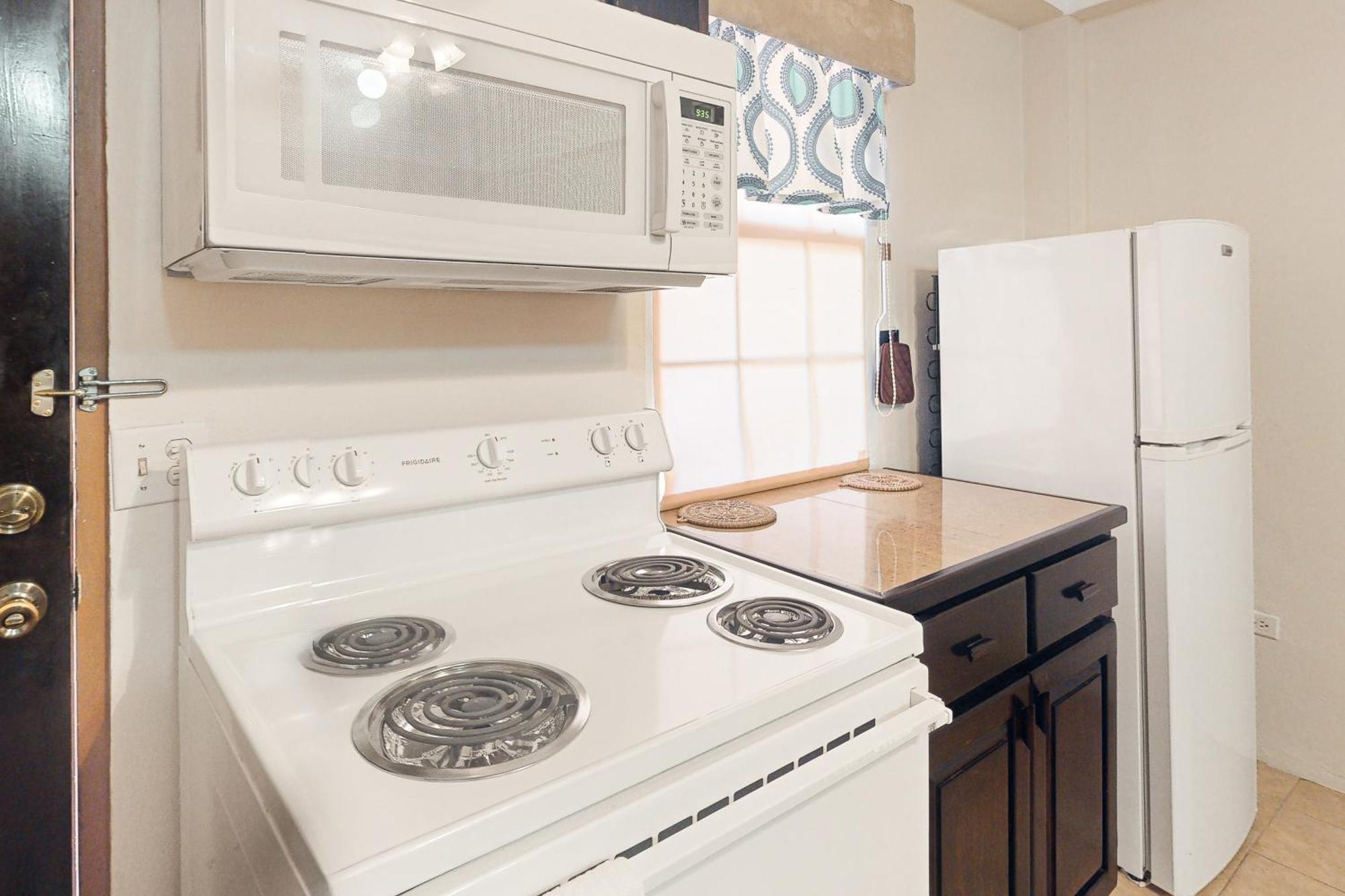 Hummingbird Home Suites San Pedro  Rom bilde