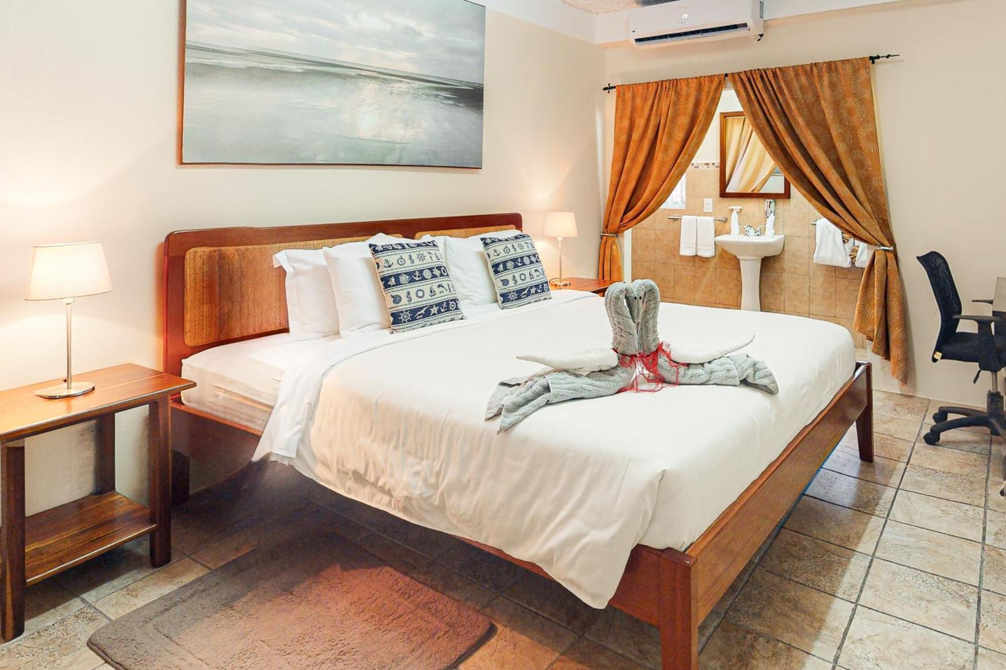 Hummingbird Home Suites San Pedro  Rom bilde