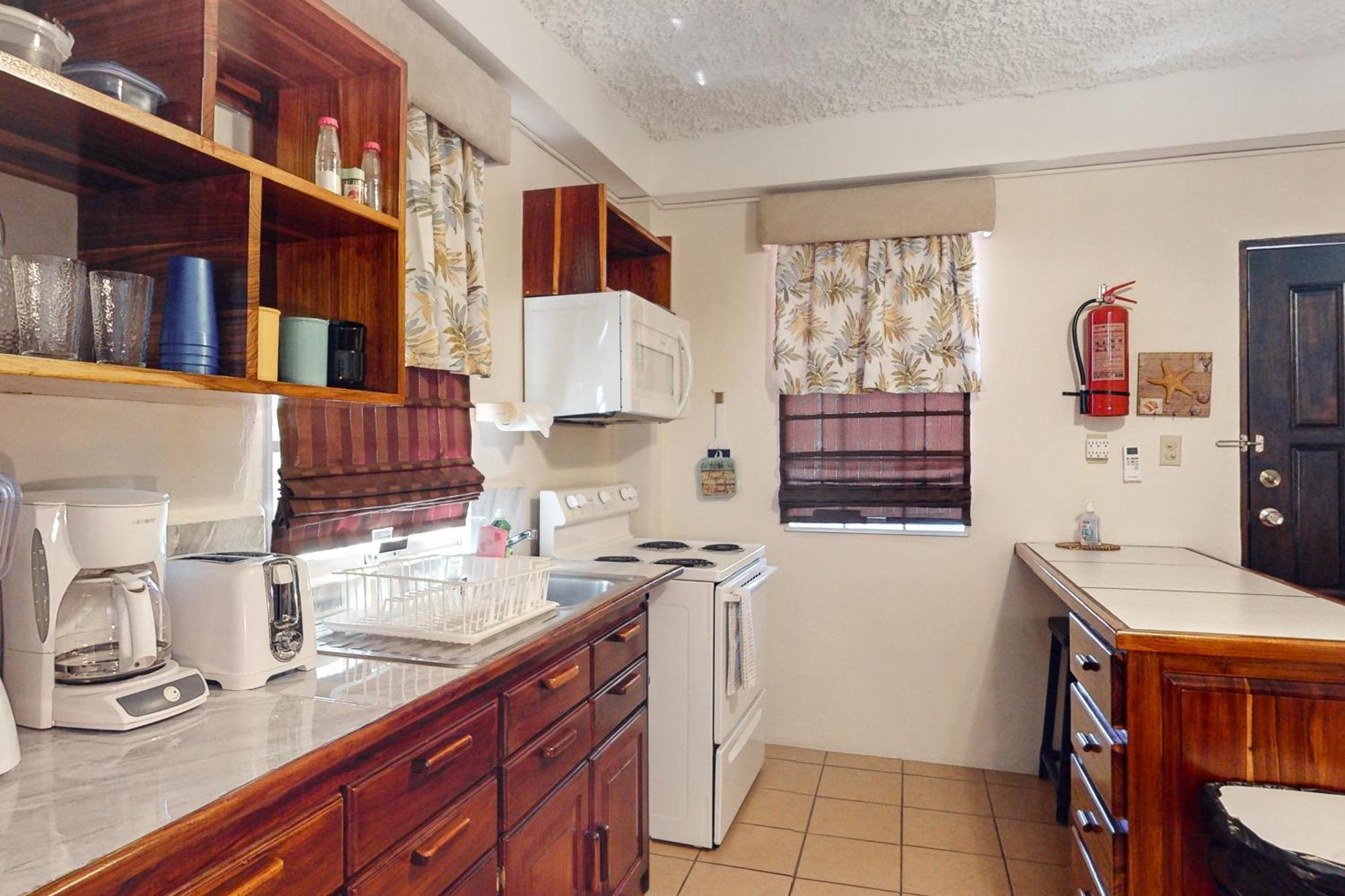 Hummingbird Home Suites San Pedro  Rom bilde
